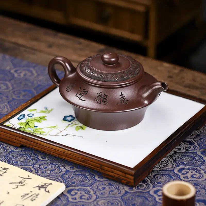 Brown ceramic teapot from Whispering Quail Yixing Zisha Yixing Teapot collection