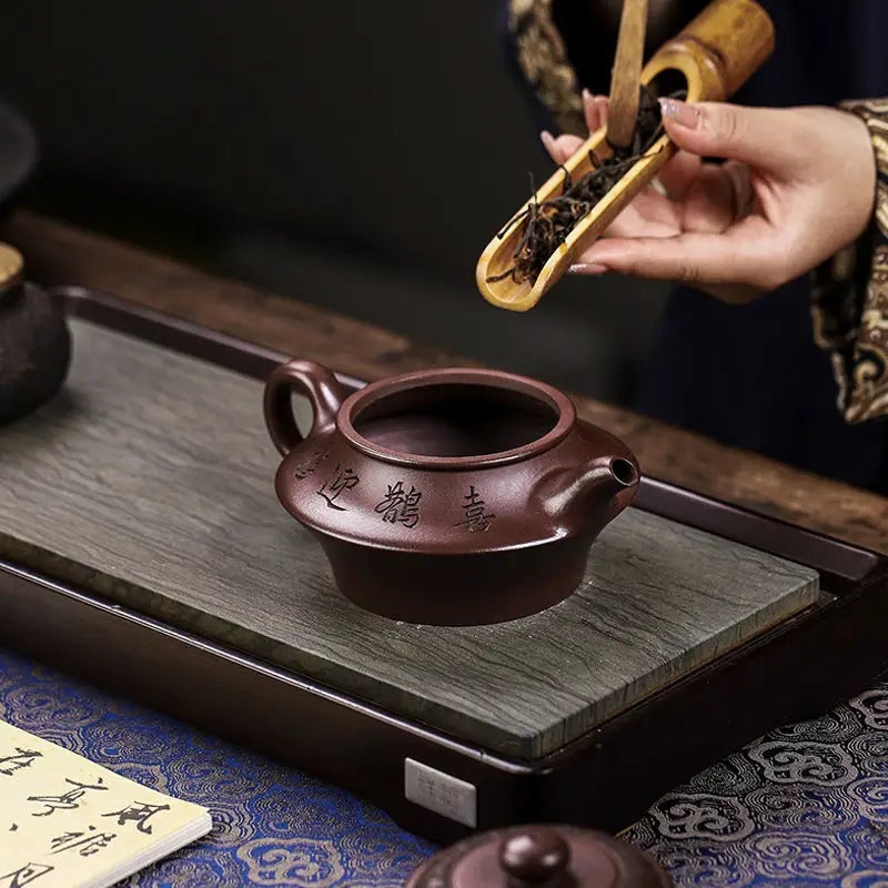 Brown ceramic teapot from Whispering Quail Yixing Zisha Yixing Teapot collection