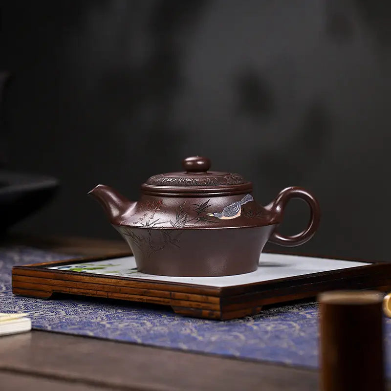 Brown ceramic Yixing Zisha teapot with bird design from Whispering Quail collection