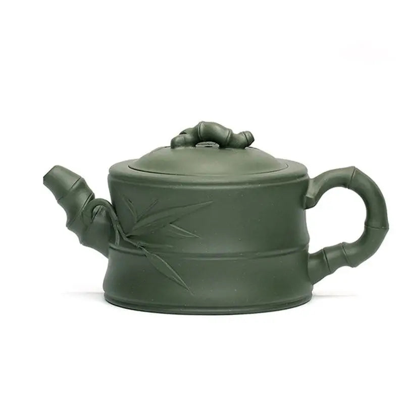 Green ceramic teapot with bamboo accents from Whispers of Bamboo, a rare green Duanni Yixing Zisha teapot