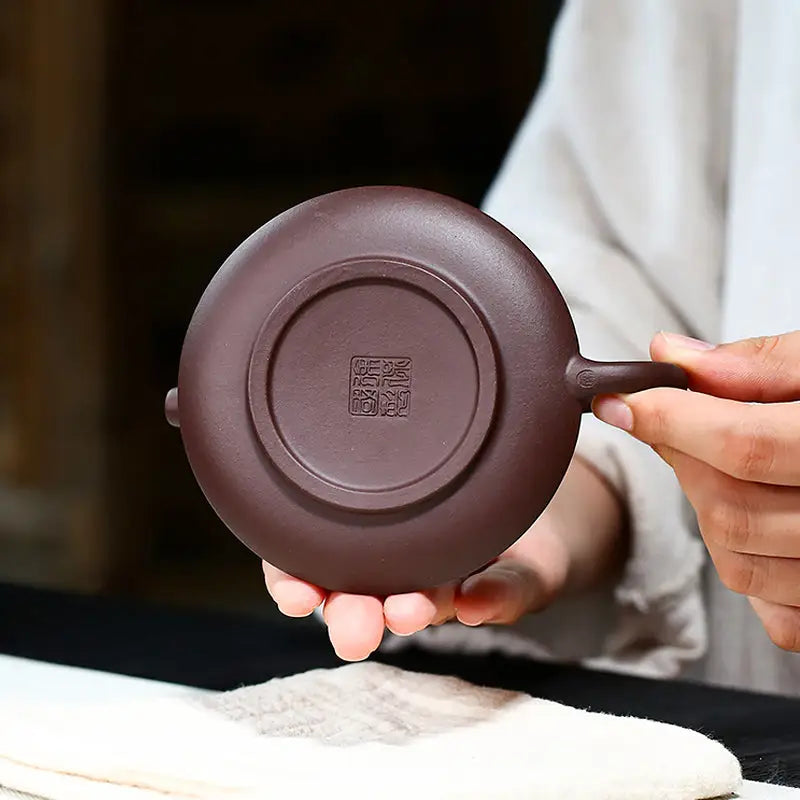 Brown ceramic teapot base from Whispers of Stillness, yixing zisha zisha teapot accessory