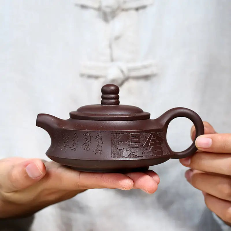 Brown ceramic Yixing Zisha teapot from the Whispers of Stillness collection