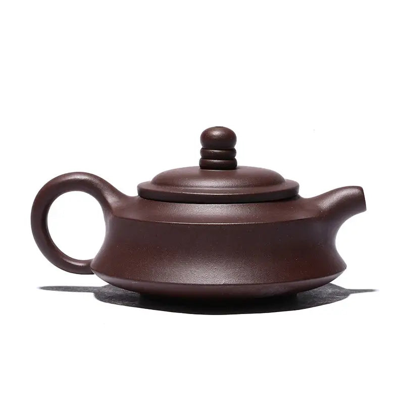 Brown ceramic Yixing Zisha teapot from the Whispers of Stillness collection