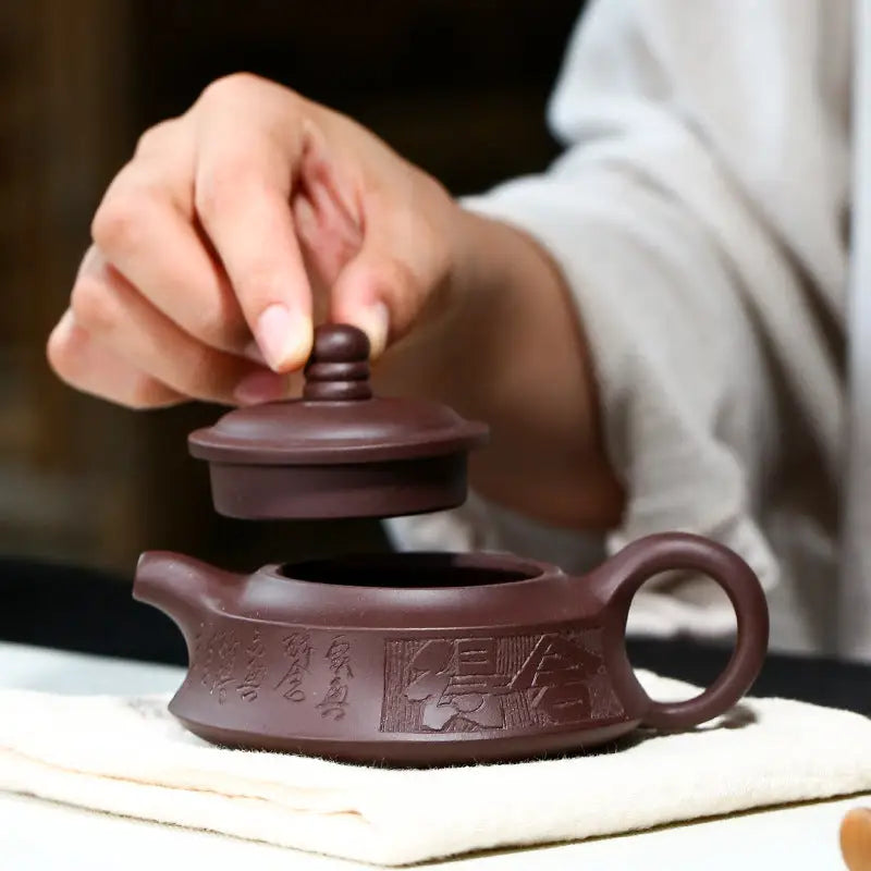 Brown Yixing Zisha teapot with lid from the Whispers of Stillness collection