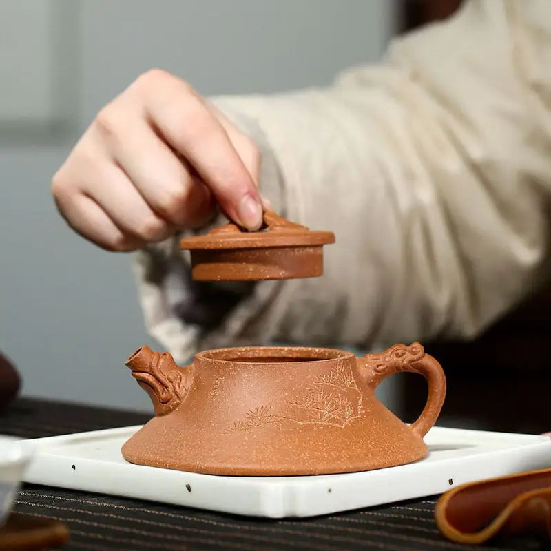 Yixing Zisha pottery Wind Dragon teapot with intricate dragon accents and traditional craftsmanship