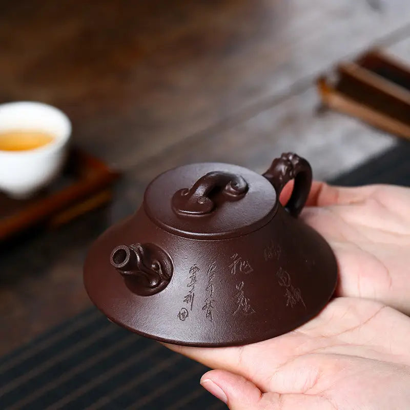 Brown ceramic Wishful Dragon yixing zisha teapot with a unique dragon spout design