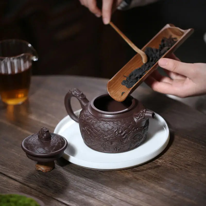Ornate brown Wishful Dragon Yixing Zisha purple clay teapot for tea lovers