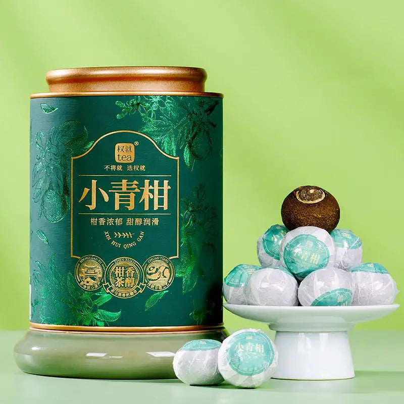 Green tea container with tea balls from Xiao Qing Gan Pu’er Tea Leaves for tea sets and mugs