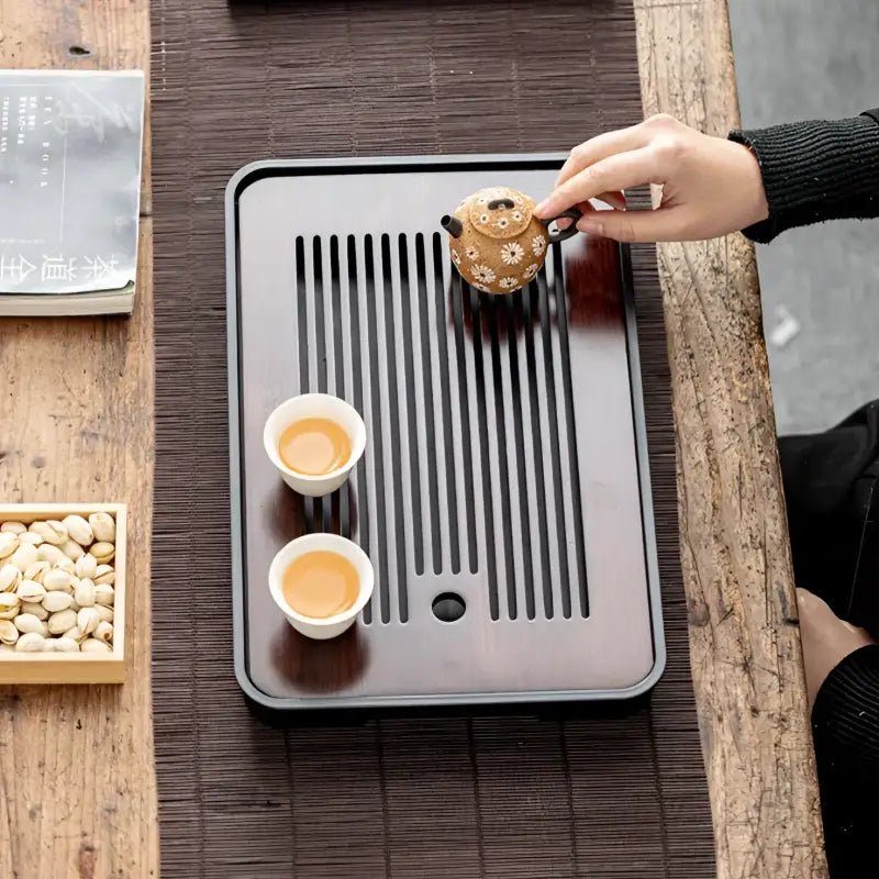 Tea set on Zen Flow Minimalist Drainage Tea Tray for gongfu tea brewing